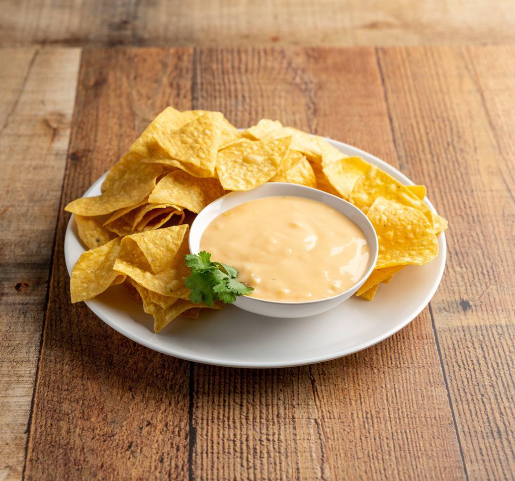 Cheese Sauce and Bag of Chips · 