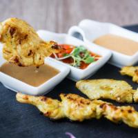 Thai-Styled Chicken Kabobs (3 Skewers) · Grilled curry chickens, served with sweet chili and curry sauce.