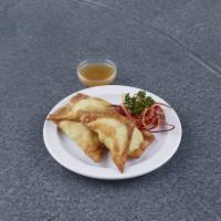 4 Pieces Crab Puffs · Snow crab, cream cheese deep-fried in wonton skin, served with plum sauce.