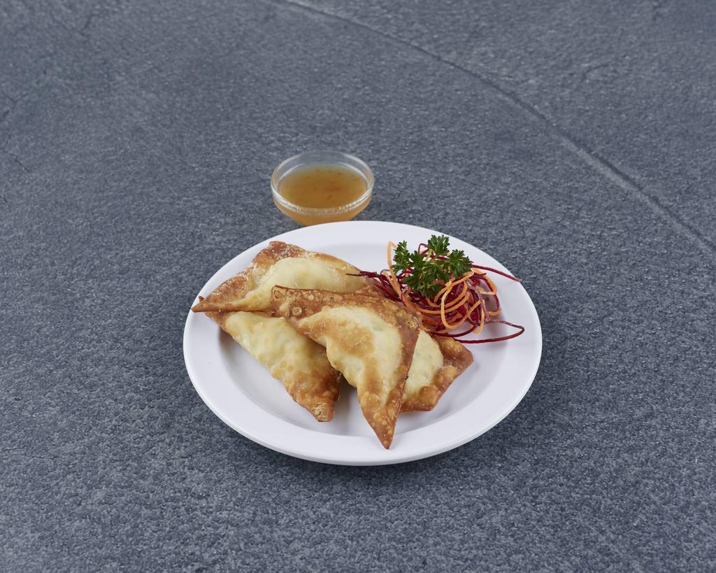 4 Pieces Crab Puffs · Snow crab, cream cheese deep-fried in wonton skin, served with plum sauce.