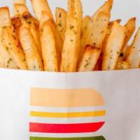 Shovel of Spuds (Fries) · Generous scoop of specially seasoned, golden, skin-on shoestring fries - consciously fried i...
