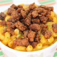 Burger Mac Bowl. · Our creamy 3-cheeze blend, mixed in-house, with herbs & spices featuring nostalgic elbow mac...