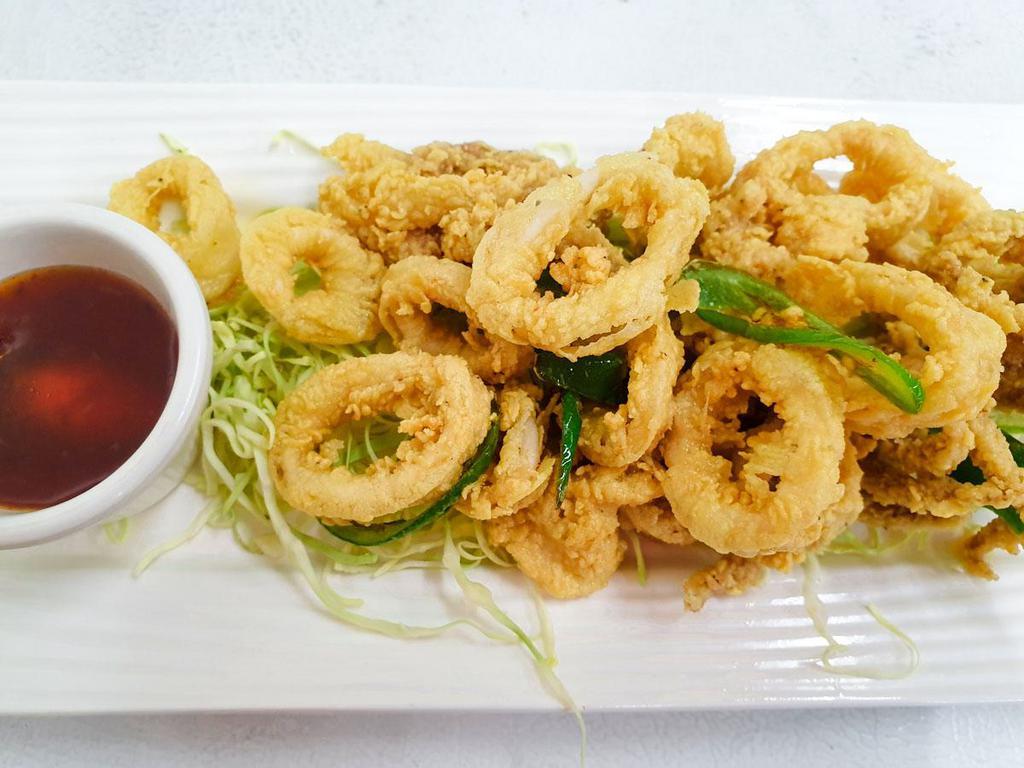 Fried Calamari · Deep-fried batter calamari served with sweet chili sauce.