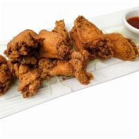 Crispy Wings · Marinated and deep-fried and served with sweet and sour sauce.