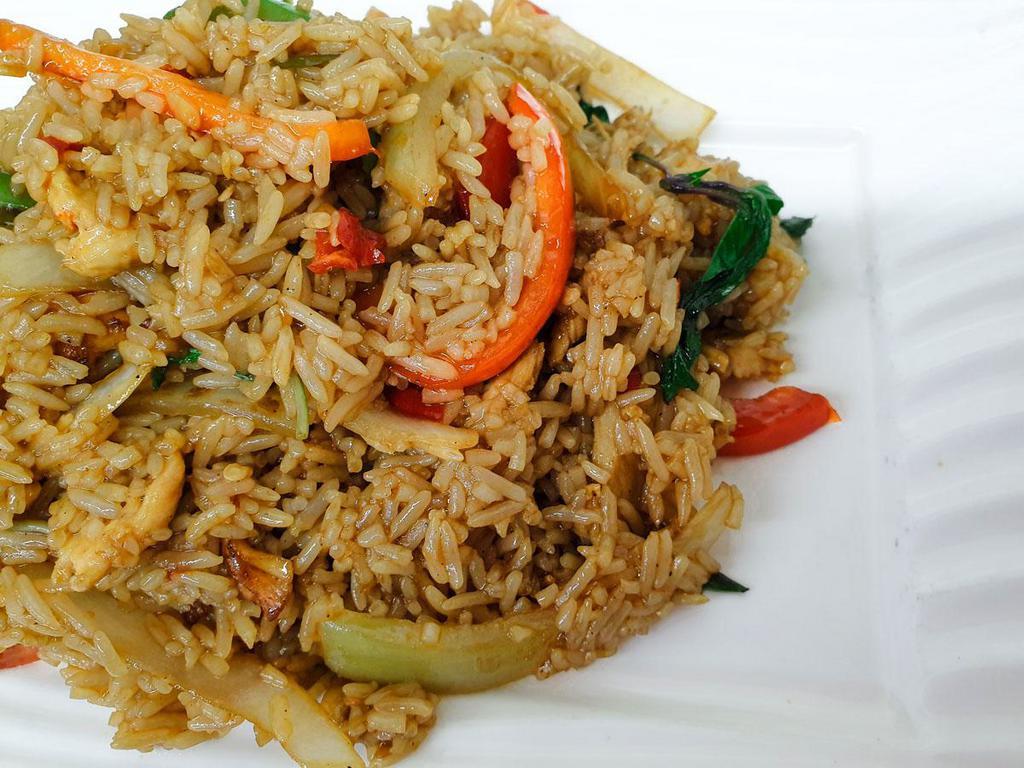 Basil Fried Rice · Jasmine rice pan fried with choice of meat, garlic, chili, yellow onion, bell pepper and basil.