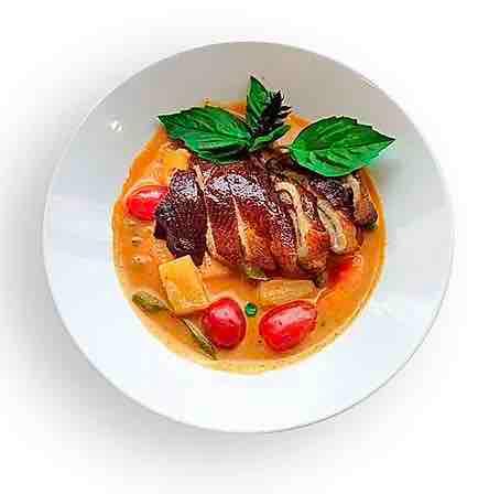 Roasted Duck Curry · Roasted duck in red curry sauce, fresh pineapple, tomato, bell pepper and basil. Without rice.