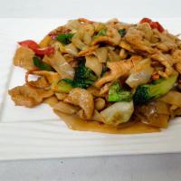Pad Kee Mao  · Drunken noodle. Flat rice noodle pan-fried with choice of meat, garlic, chili, mushroom, veg...