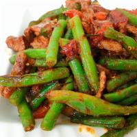 Pad Prik Khing · Choice of meat sauteed with sweet homemade curry paste, green bean, kaffir lime leaves and b...