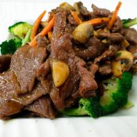 Beef Oyster Sauce · Sauteed beef with garlic, mushroom, green onion and served with over steamed broccoli. 