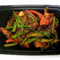 Flaming Fish · Batter tilapia fillet then sauteed with homemade curry paste, green bean, bell pepper and ka...