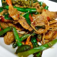 Pad Cha Catfish · Deep-fried catfish fillet, sauteed in spicy homemade curry paste with basil, wild ginger, gr...