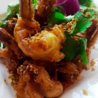 Garlic Prawn · Batter jumbo prawn with garlic and black pepper sauce sprinkled with fried garlic and cilant...