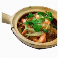 Prawn's Clay Pot · Jumbo prawn with silver noodles, ginger, celery and black pepper served within clay pot.