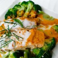 Choo Chee Salmon · Salmon fillet in panang curry sauce with bell pepper, steamed veggies and kaffir lime leaves.