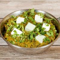59. Sag Paneer · Spinach cooked with herbs, spices and homemade cheese cubes.