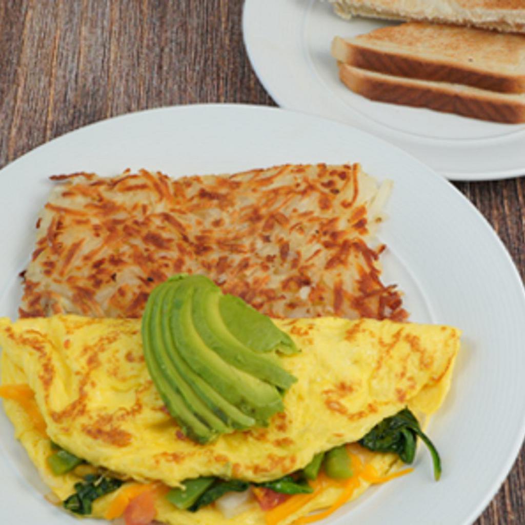 California Omelet · Three egg omelet, tomato, bell peppers & onions, cheddar cheese, spinach, avocado, hash browns, toast.