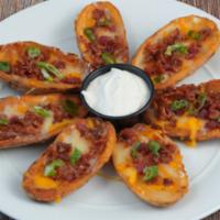 Loaded Skins · Bacon, jack and Cheddar Cheese, Chive Dip.