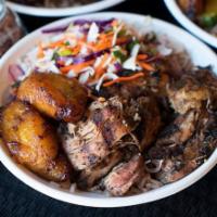 Kingston Style Jerk Chicken · Marinated in our signature jerk rub and then fire grilled. Served with coconut rice, beans, ...