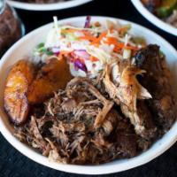 One Love Special · A combination of fire grilled jerk chicken and slow roasted jerk pork. Served with coconut r...
