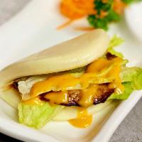 Pork Belly Buns · 3 pieces. Pork belly slice and lettuce in steamed Japanese style bun, served with spicy mayo.