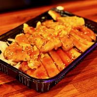 Chicken Teriyaki · Grilled chicken strips on a bed of grilled onions, topped with teriyaki sauce and sesame see...