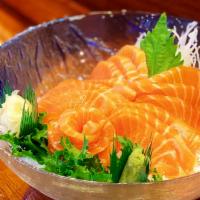 Sake Don  · 15 pieces salmon sashimi on a bed of seasoned rice.
