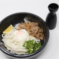 Niku Bukkake Cold Udon · Sweet and tender beef onions, green onions, soft boiled egg and sesame seeds.