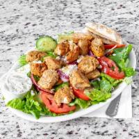 Grilled Chicken Salad · Served with Greek salad.