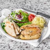 Authentic Greek Chicken · Grilled chicken stuffed with spinach, feta cheese and olive oil. cooked our own special way.