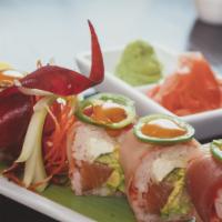 Sanchez Roll · Tuna and escolar on top of smoked salmon, cream cheese, cucumber and avocado with a smidge o...