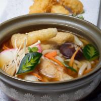 Udon Noodle Soup · Flavoured broth, Japanese udon noodle, shiitake mushroom. Topped with chopped scallions, fri...