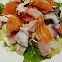 Sashimi Salad · Fresh mixed greens with salmon, white tuna, yellowtail & octopus. Served with creamy sesame ...