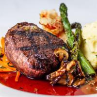 Filet Mignon · Grilled 8 oz filet mignon flamed broiled to perfection topped with  sea urchin butter, shiit...