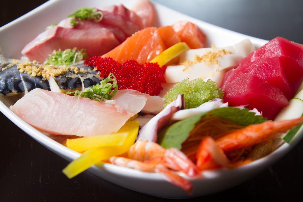 Chirashi · Traditional chef's choice assortment of fresh sashimi served over sushi rice.