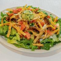 The ZuZu Salad · Our best seller, simple but delicious. Romaine lettuce tossed in our signature rosemary-lime...