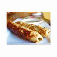 Chicken Reshmi Kabab · Minced white chicken marinated in light Indian spices and baked in a clay oven to its perfec...