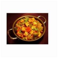 Kadai Paneer · Fresh homemade cottage cheese cubes cooked with delicious onion and tomato sauce mix. Vegan.