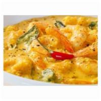 Mild Jhinga Malai · Shrimp cooked with coconut milk and creamy curry with mild spices.