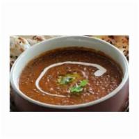Daal Makhani · Delicately assorted whole lentils, kidney beans cooked with creamy sauce, garnished with gar...