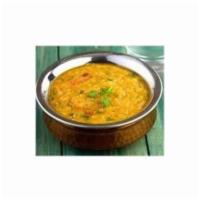 Jhane Ko Daal · Yellow lentils cooked to perfection in Himalayan spices and herbs. Vegetarian.