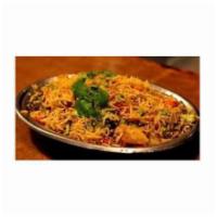 Vegetable Biryani · Aromatic basmati rice mixed with vegetables, enhanced with saffron, cooked with a special sa...
