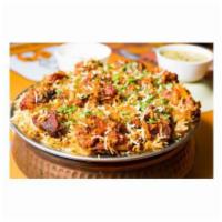 Goat Biryani · Aromatic basmati rice mixed with bone-in goat meat richly flavored with saffron and cooked i...