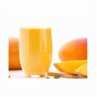 Mango Lassi · Homemade yogurt blended with sweet mango served chilled. Vegan.