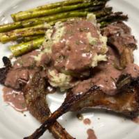 Lamb Chops · Three grilled lamb chops, served with home style mashed potatoes and asparagus. ( The sides ...