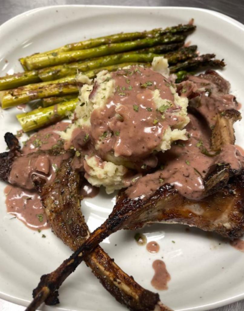Lamb Chops · Three grilled lamb chops, served with home style mashed potatoes and asparagus. ( The sides cannot be changed or substituted with any other sides)