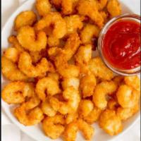 Popcorn Shrimp and Fries · Popcorn shrimp and fries served with SanChe’s seafood sauce.