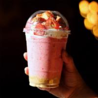 Strawberry Cheesecake Bomb! · Milky strawberry smoothie topped with whipped cream, made-in-house cheesecake chunks, fresh ...