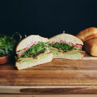 The West Coast Tofurky (v) · Oven-roasted tofurky, avocado, mixed greens, tomato, red onion, vegan basil aioli and lemon ...