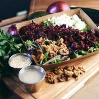 The Beet Box · Mixed greens, roasted beets, quinoa, parsley, candied pecans, crumbled goat cheese, housemad...