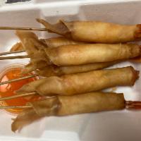 MERMAIDS  · 6 pcs Seasoned shrimp in crispy roll skins served with sweet chili sauce.